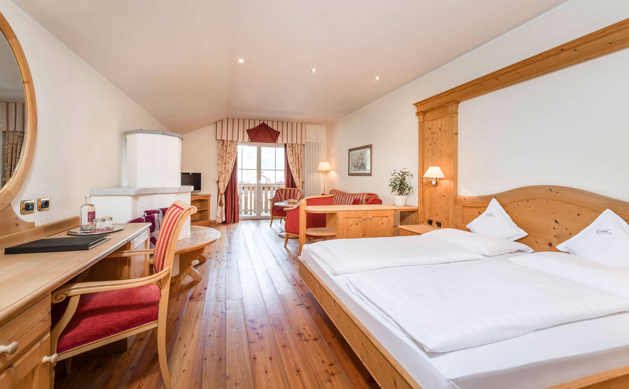 Camera da letto e zona giorno della suite familiare - Vitalhotel Erica