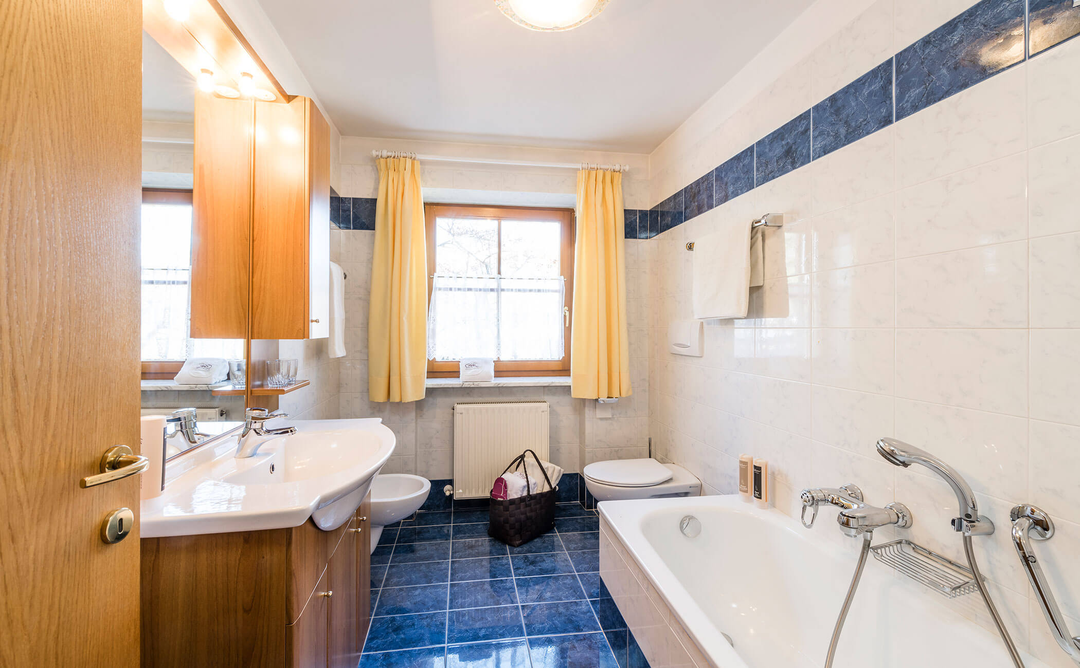 Bagno con vasca nell'appartamento vacanze - Vitalhotel Erica