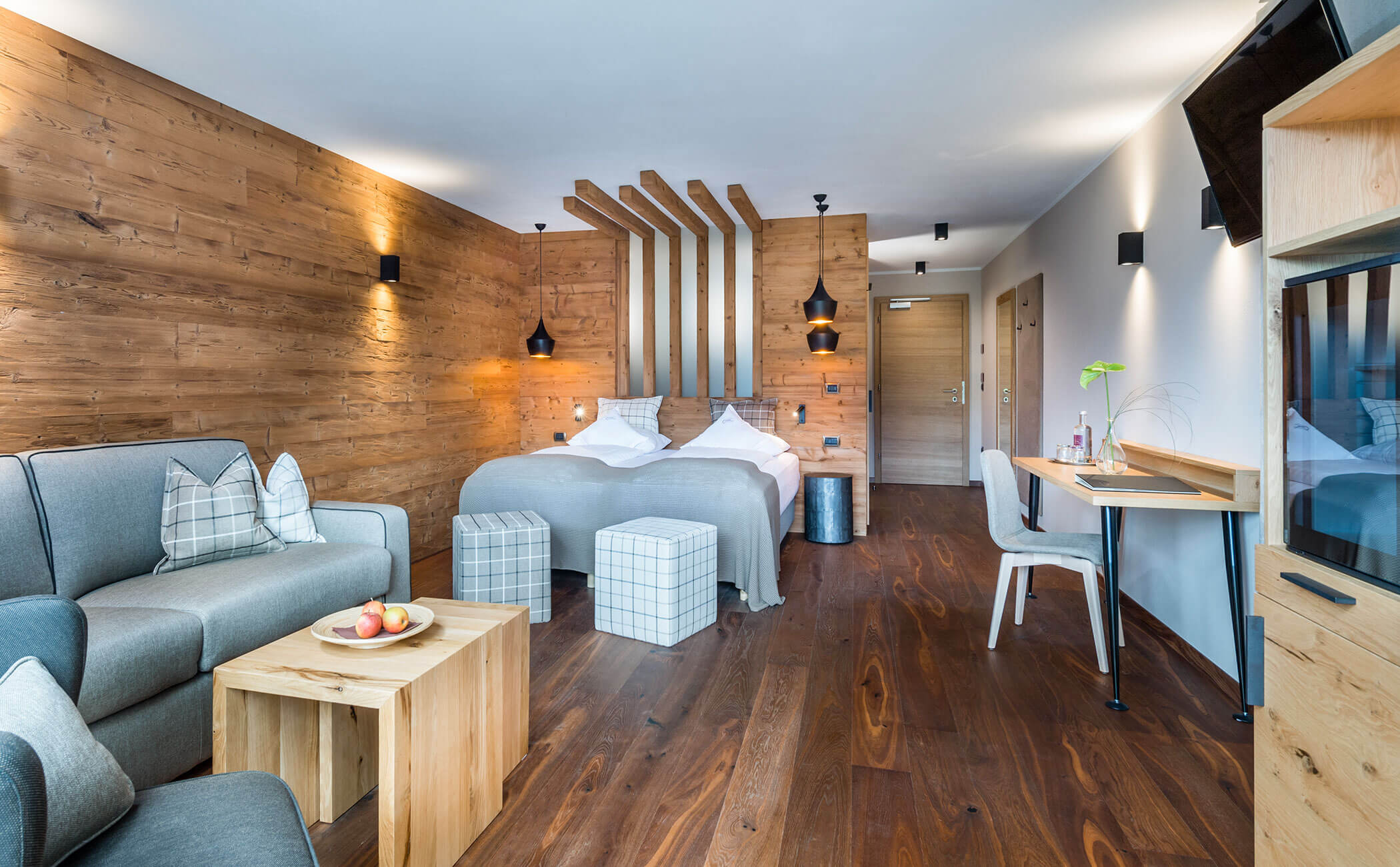 Zona notte e zona giorno della Suite Dolomit - Vitalhotel Erica