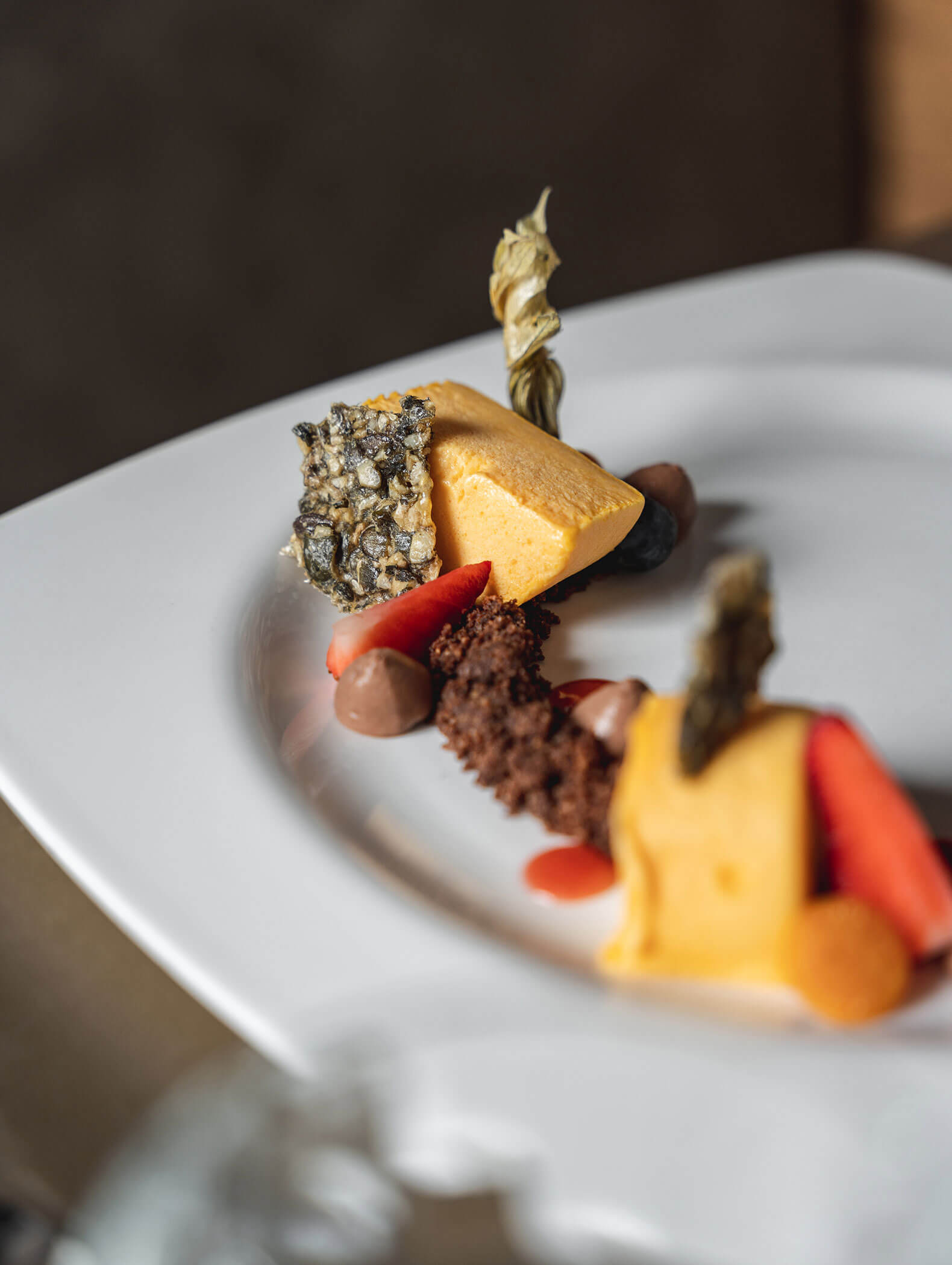 Un dessert ben disposto, composto da diversi componenti - Vitalhotel Erica